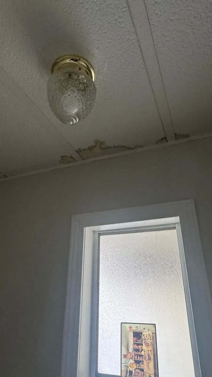 Interior ceiling water damage from delayed roof  repair in Southern California home fixed by Dove Roofing