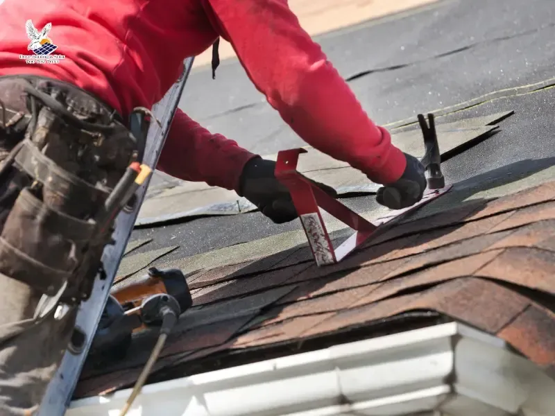 Dove Roofing crew member installing asphalt shingles on a Riverside home.