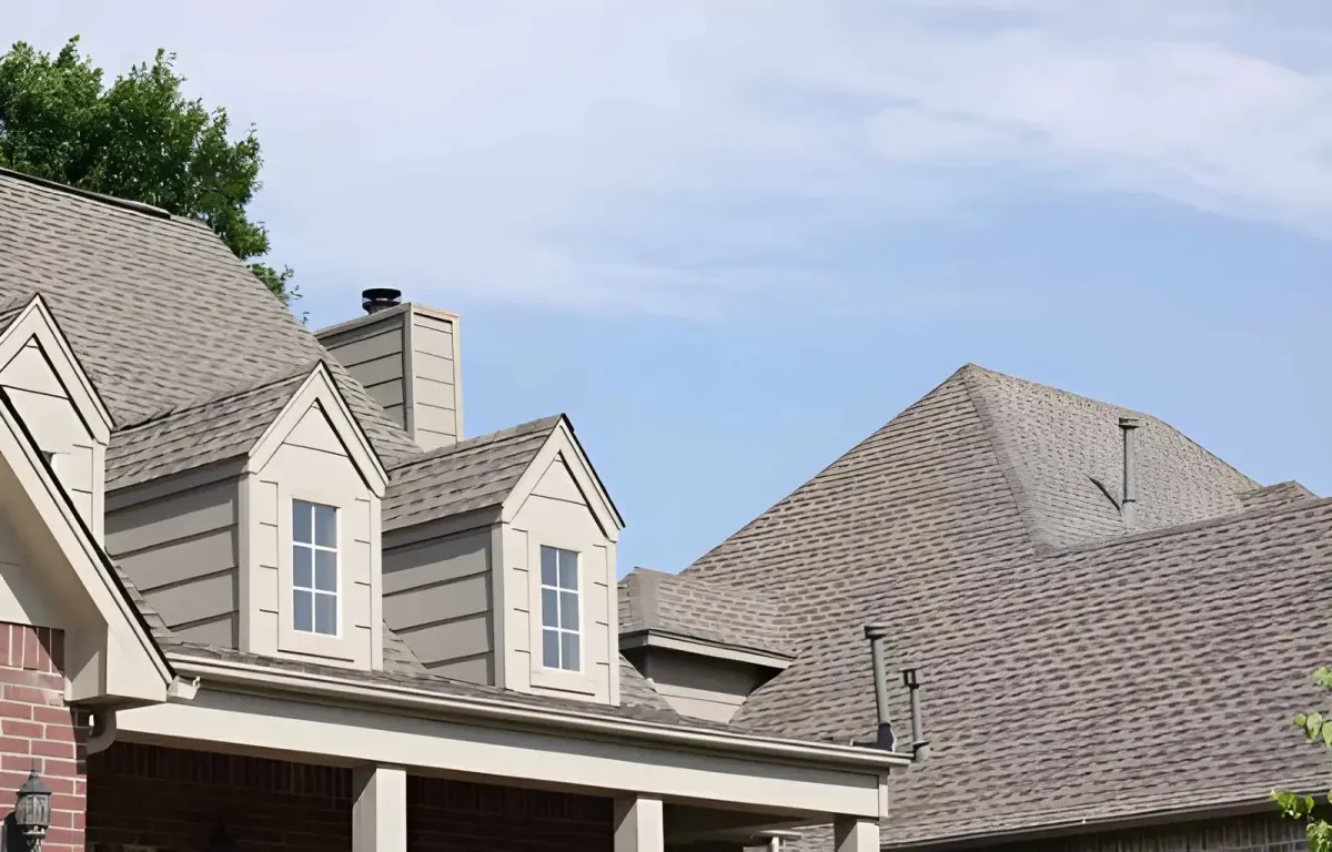 Residential home with dimensional asphalt shingle roofing and dormer windows in Menifee                     