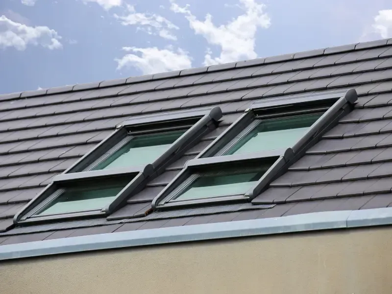 Two roof windows installed on a tile roof in Highland, CA
