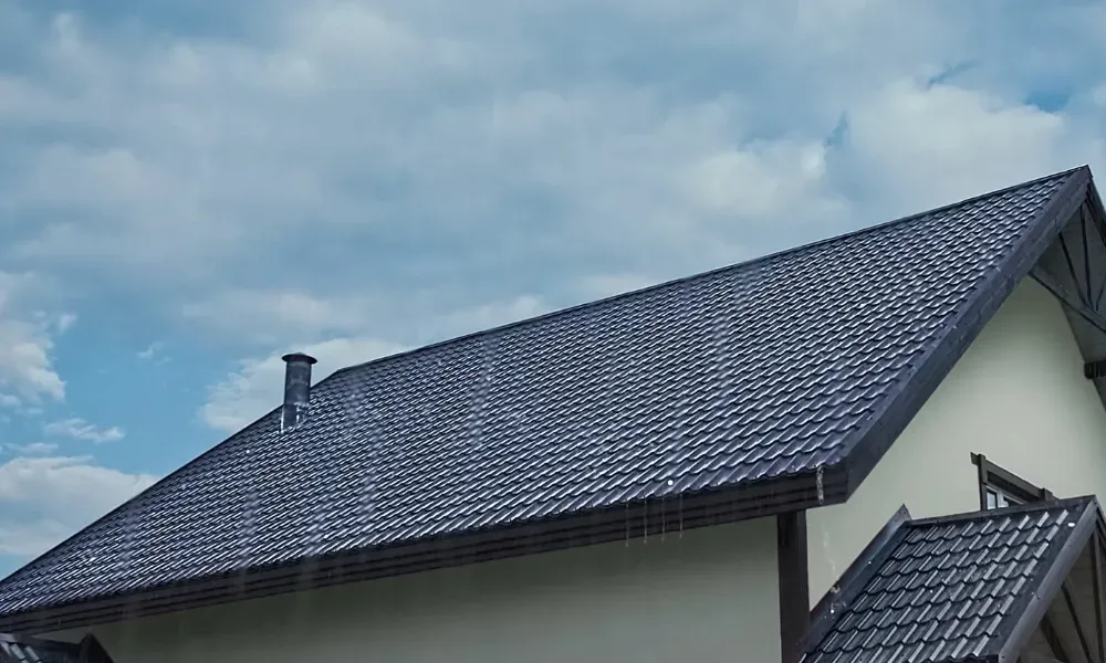 Torch flame heat-welding bituminous membrane on flat roof — what is the best roofing material for a flat roof