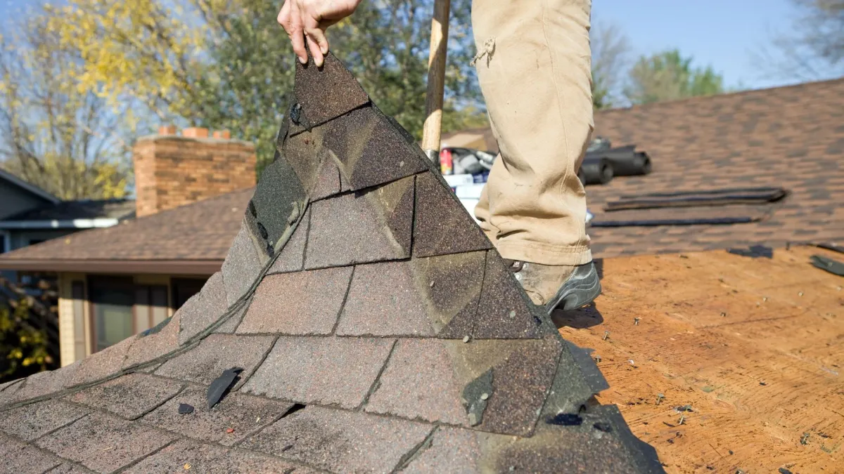 David Berumen, owner of Dove Roofing and Construction, on site with his crew at a Cathedral City home