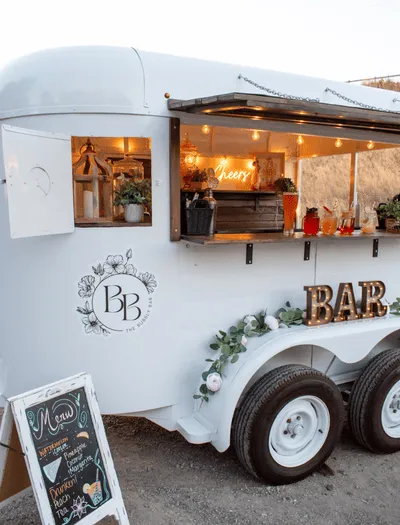mobile bar, bartenders, mobile bar for events, wedding bartenders, vintage horse trailer