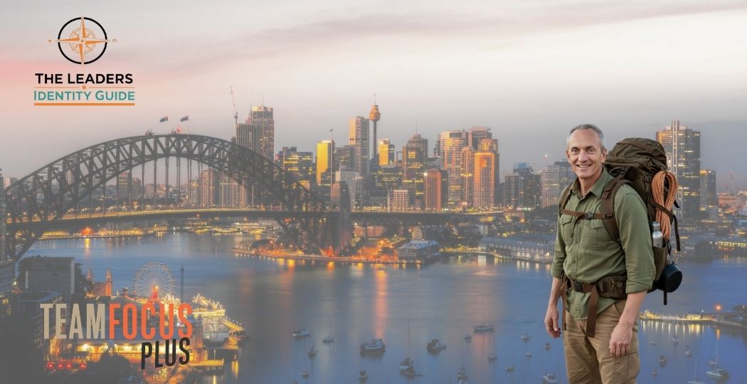 Portrait of Ross Judd — smiling professional headshot with Sydney streets background
