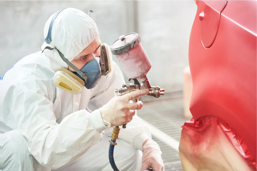 Local mechanic near me in logan Utah doing mechanic work at an auto body shop