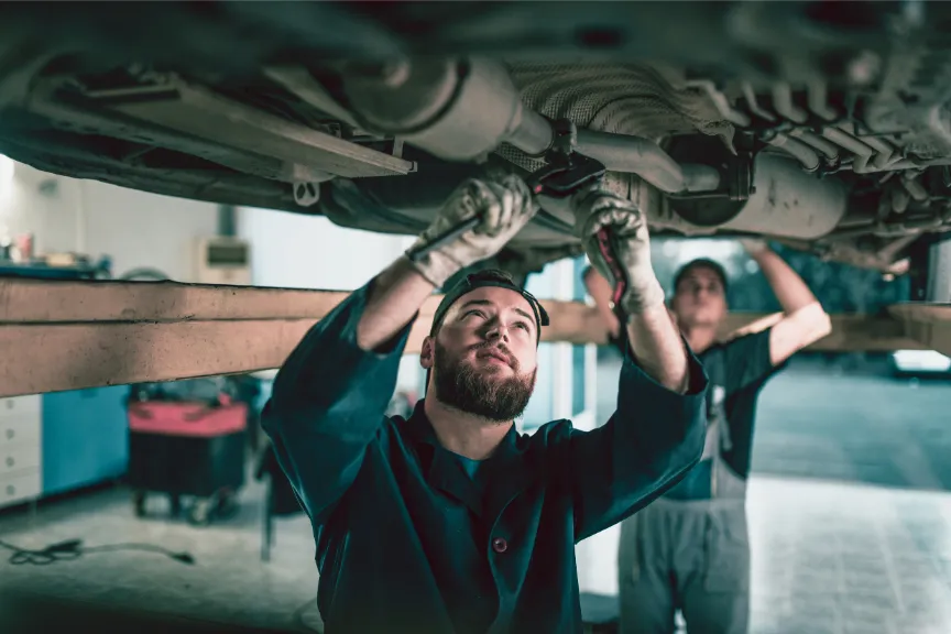 Local mechanic near me in logan Utah doing mechanic work at an auto body shop