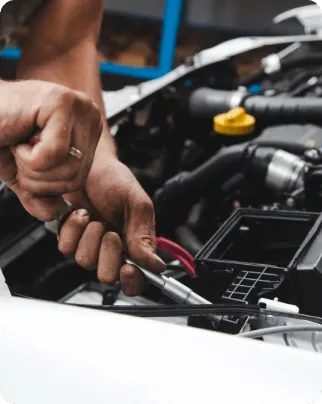 Local mechanic near me in logan Utah doing mechanic work at an auto body shop