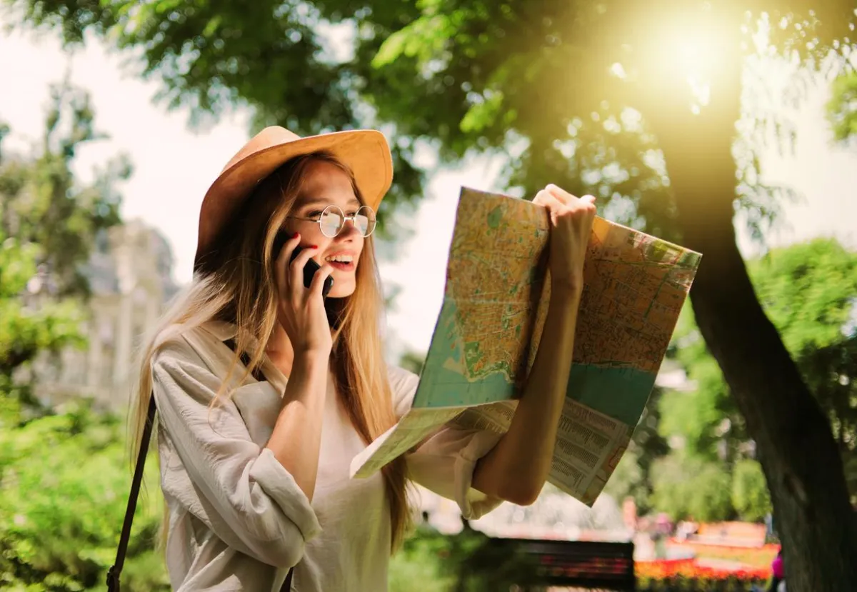 Convert Customer Journey. Woman with a map.