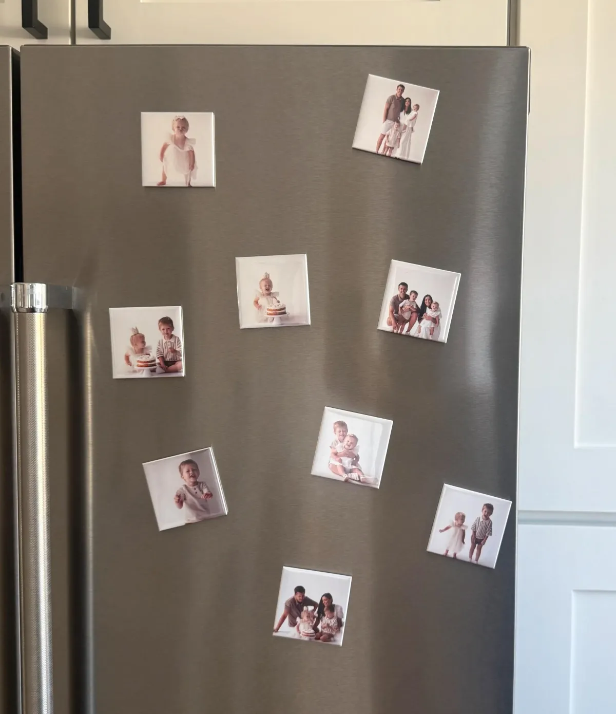 Woman holding photo magnet