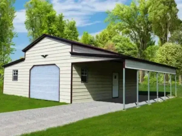 Beige metal garage structure with attached carport and roll-up door, set on a grassy landscape.