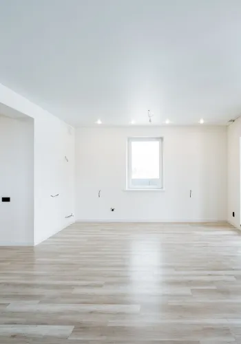 Recently installed laminate flooring in a residential interior in Spruce Grove.