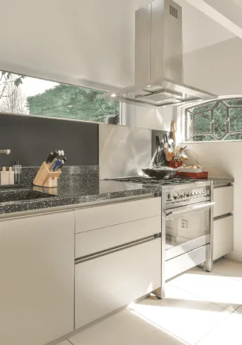 Kitchen renovation in St. Albert with custom white cabinets and quartz countertops
