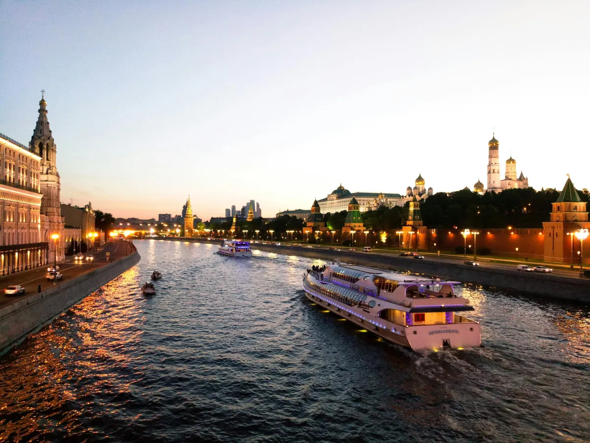 Adventurous adults 40+ enjoying a European river cruise at sunset