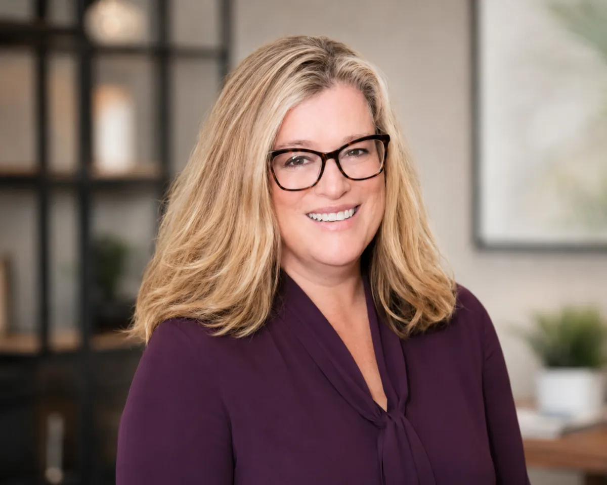 Warm, non-corporate portrait photo of the founder of Aveliara AI Studio
