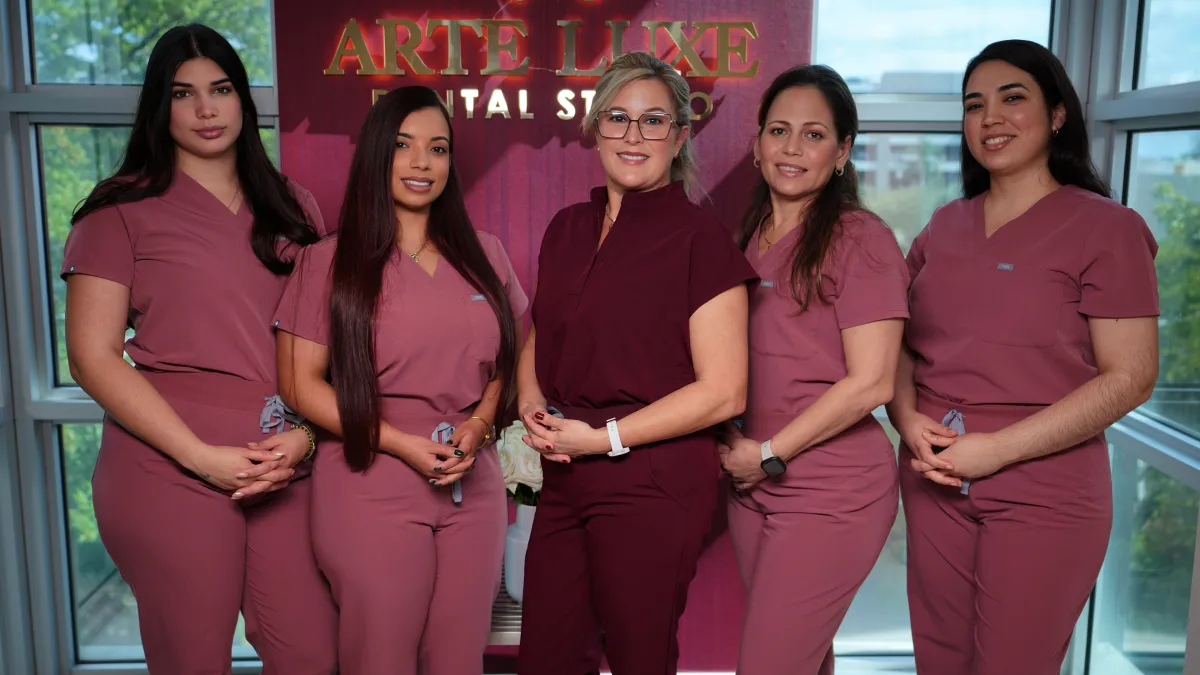 A group of toothbrushes sitting on top of each other