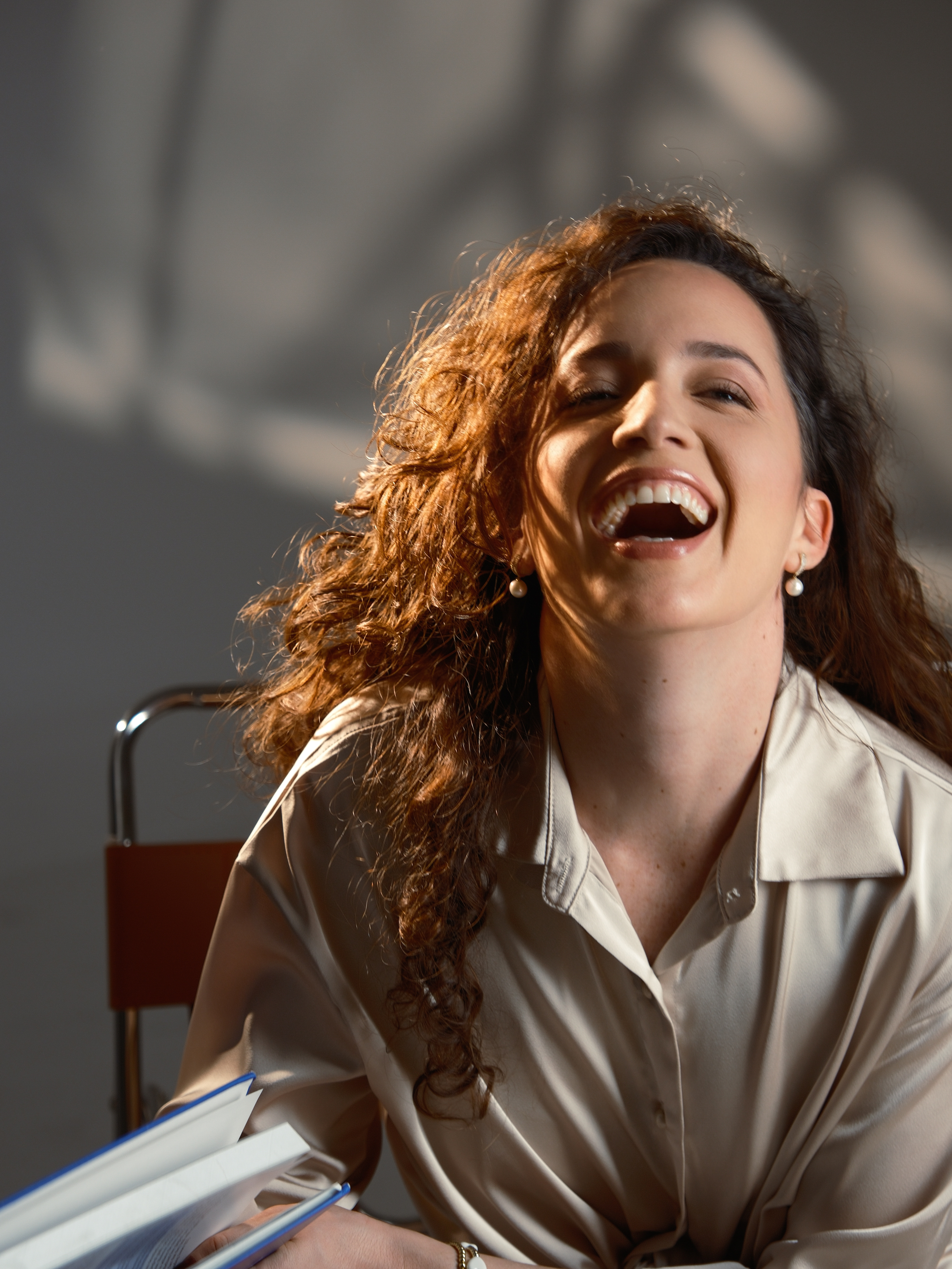 A bathroom mirror with a reflection of a fish in it