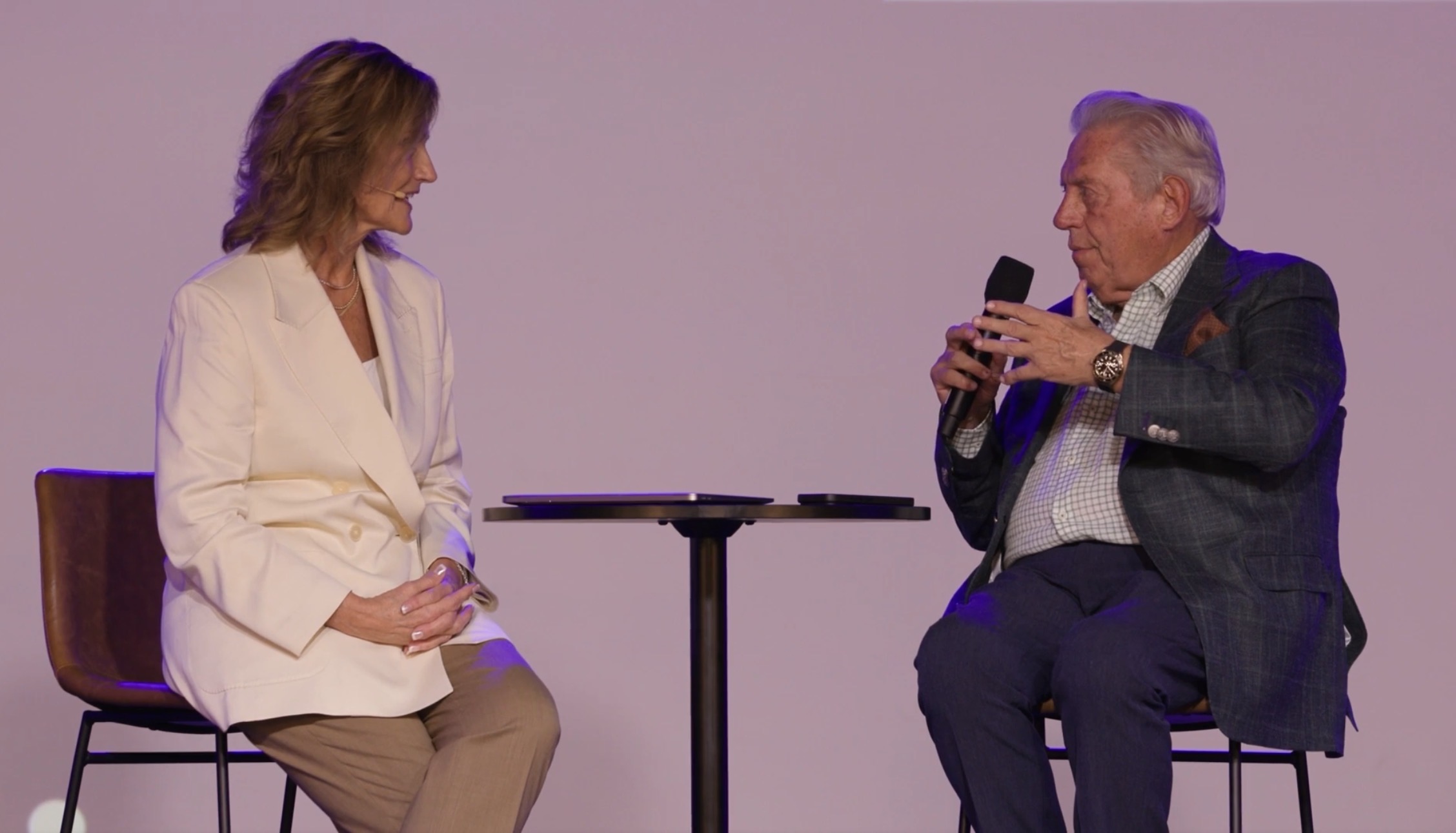 Pamela Potts on stage with John C Maxwell