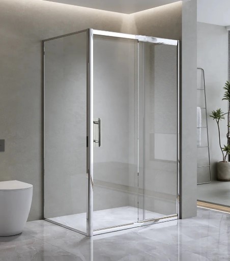 framed shower with grey walls and white base