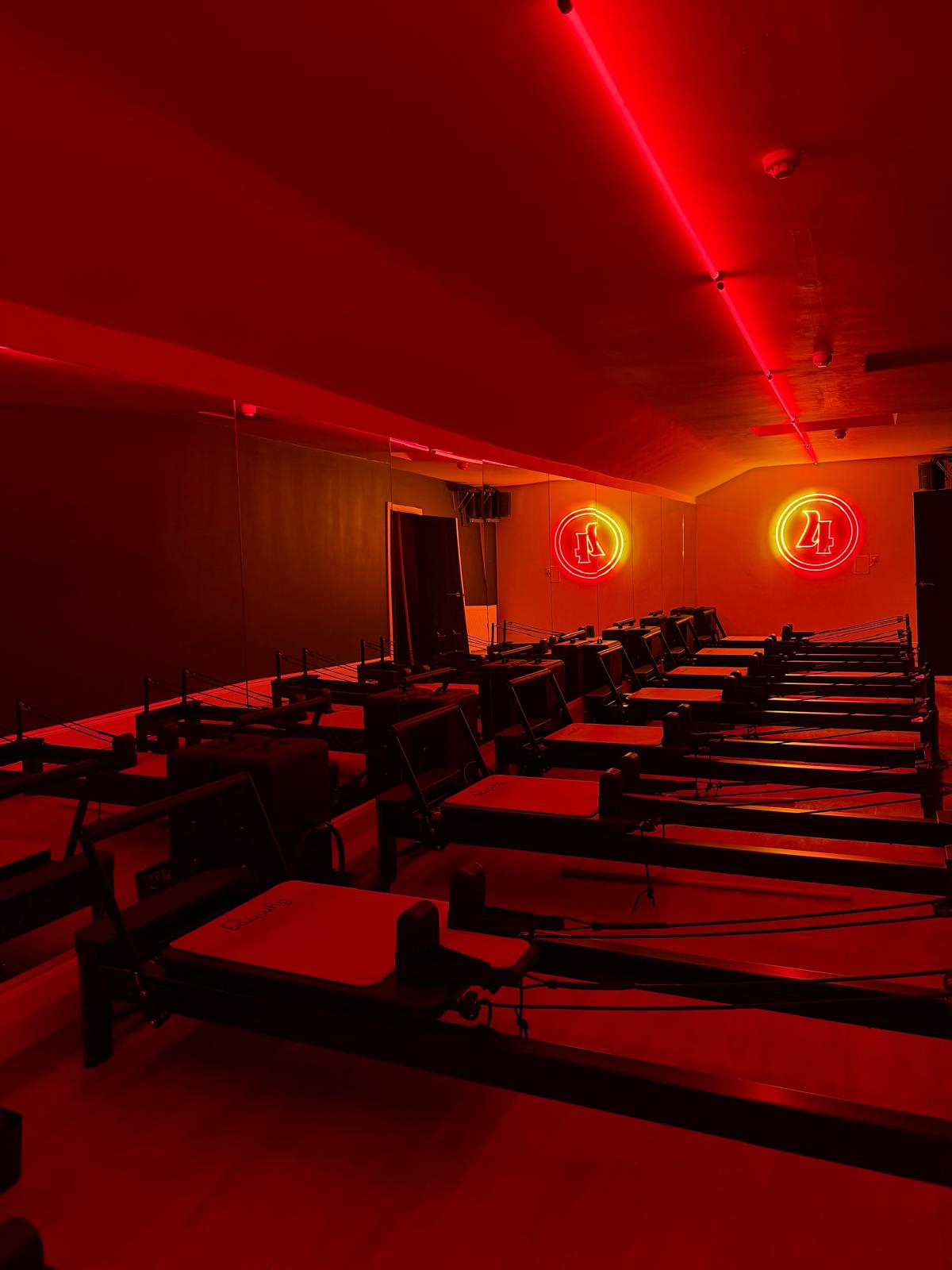 Woman stretching on yoga mat in park
