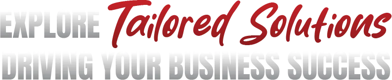 Man in glasses talking on phone at desk