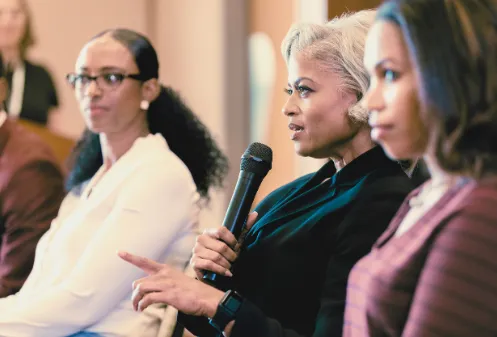 Women holding microphone