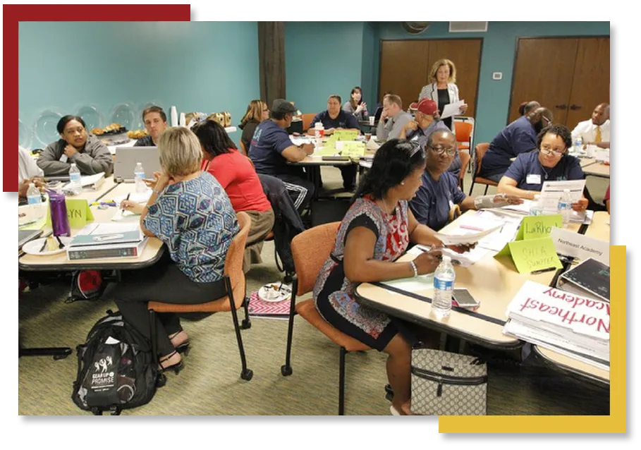 Coursera logo on phone and laptop screen