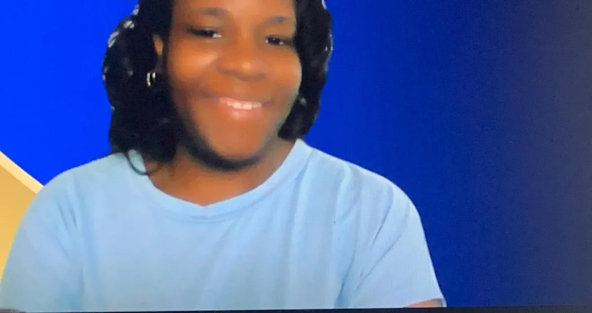 men and women gathered around a table