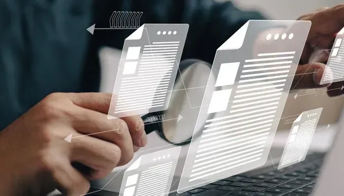 Hands interacting with digital interface for marketing tools