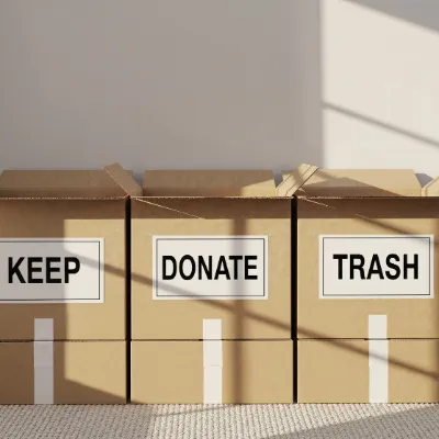 Boxes that are marked with Keep Donate and Trash