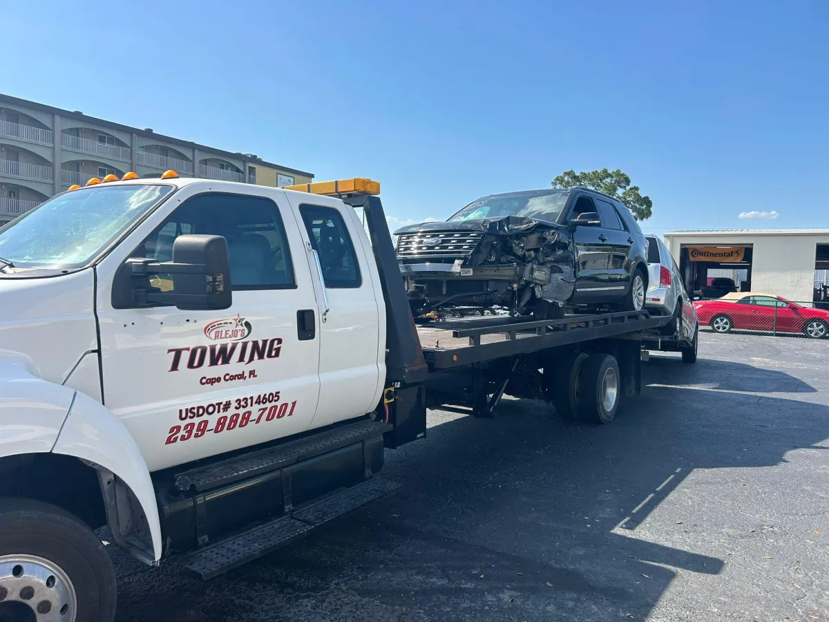Logo and contact info for ALEJO’S TOWING INC, towing service in Cape Coral, FL. Partner of GLO Auto Repair.