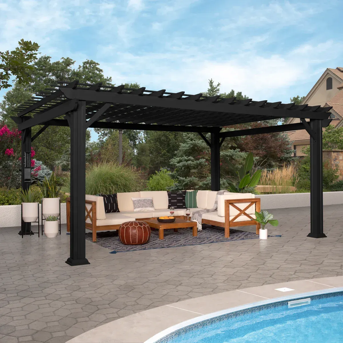 Cozy wooden pergola with fire pit and patio seating in a landscaped backyard.