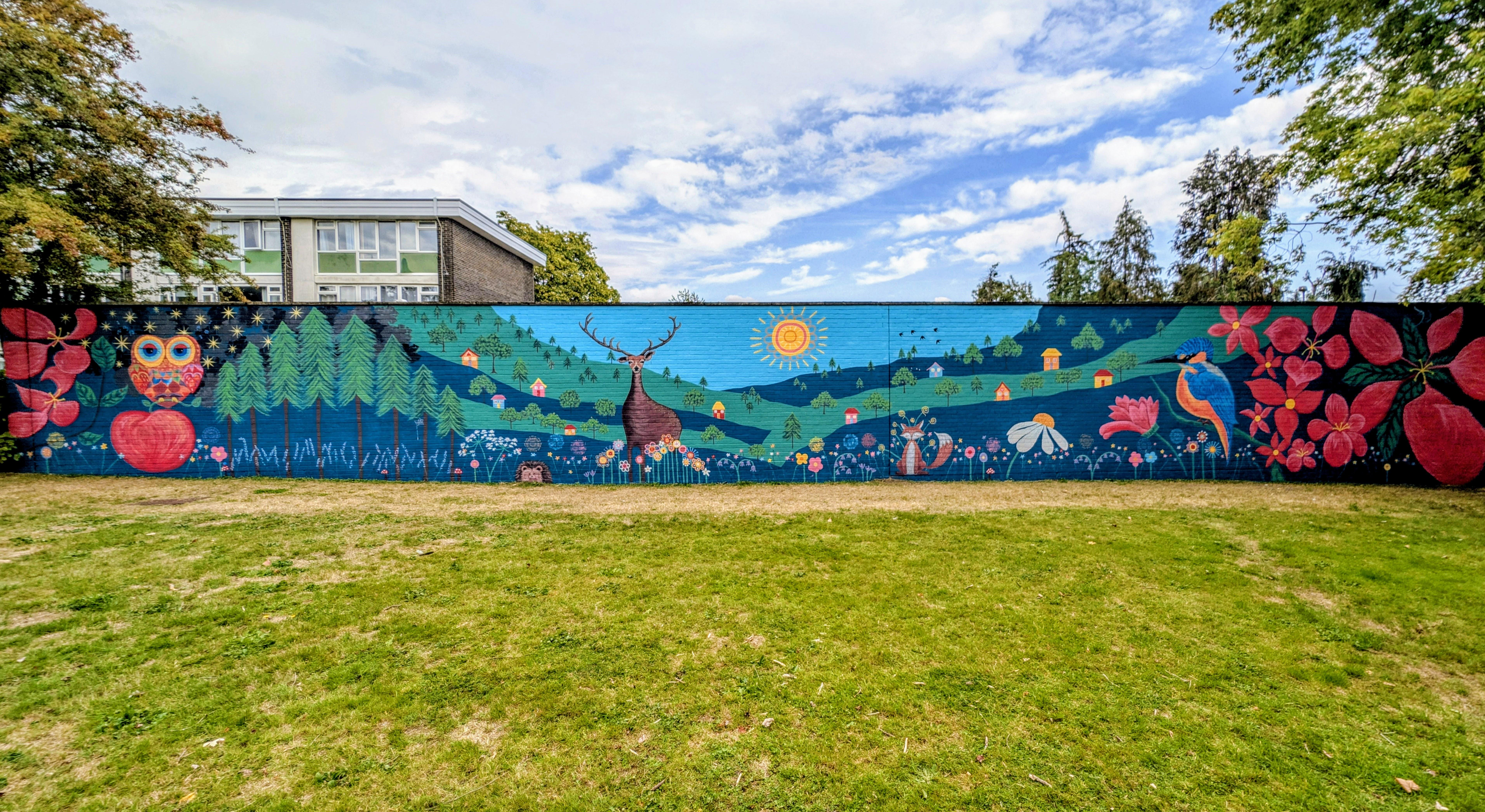 Wild & Wonder™ community mural by Janine Tonkin™ at Campion House, Jock's Lane, Bracknell. Panoramic view of the completed Wild, Wonder & Bloom™ mural celebrating local wildlife, nature, community and creative placemaking.