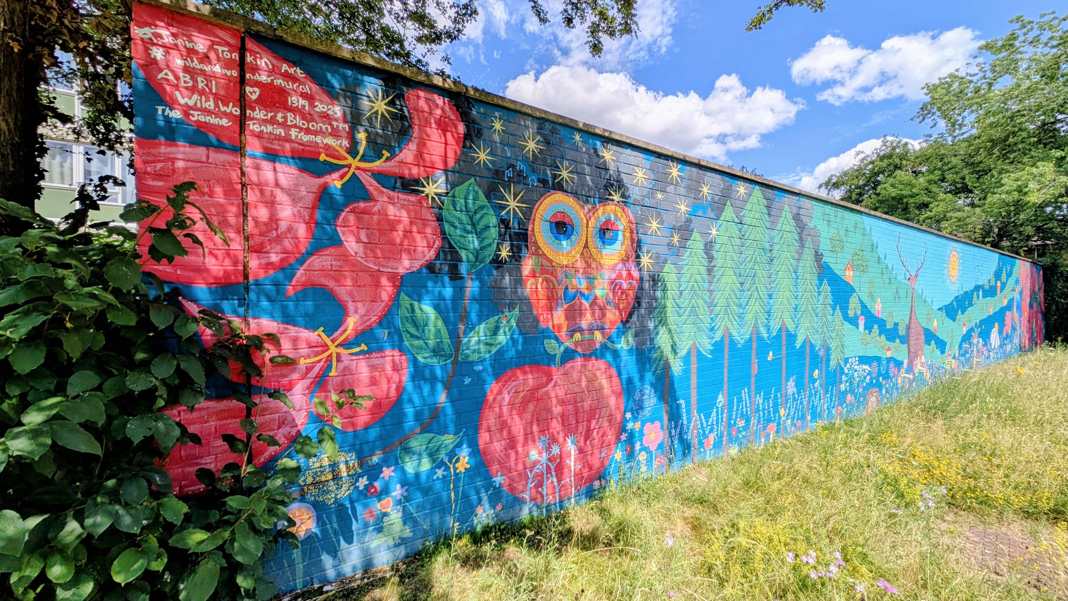 Left perspective of the Wild & Wonder™ mural by Janine Tonkin™ at Campion House, Bracknell. Features woodland owl, native trees, blossom and hidden discoveries within the Wild, Wonder & Bloom™ creative methodology.