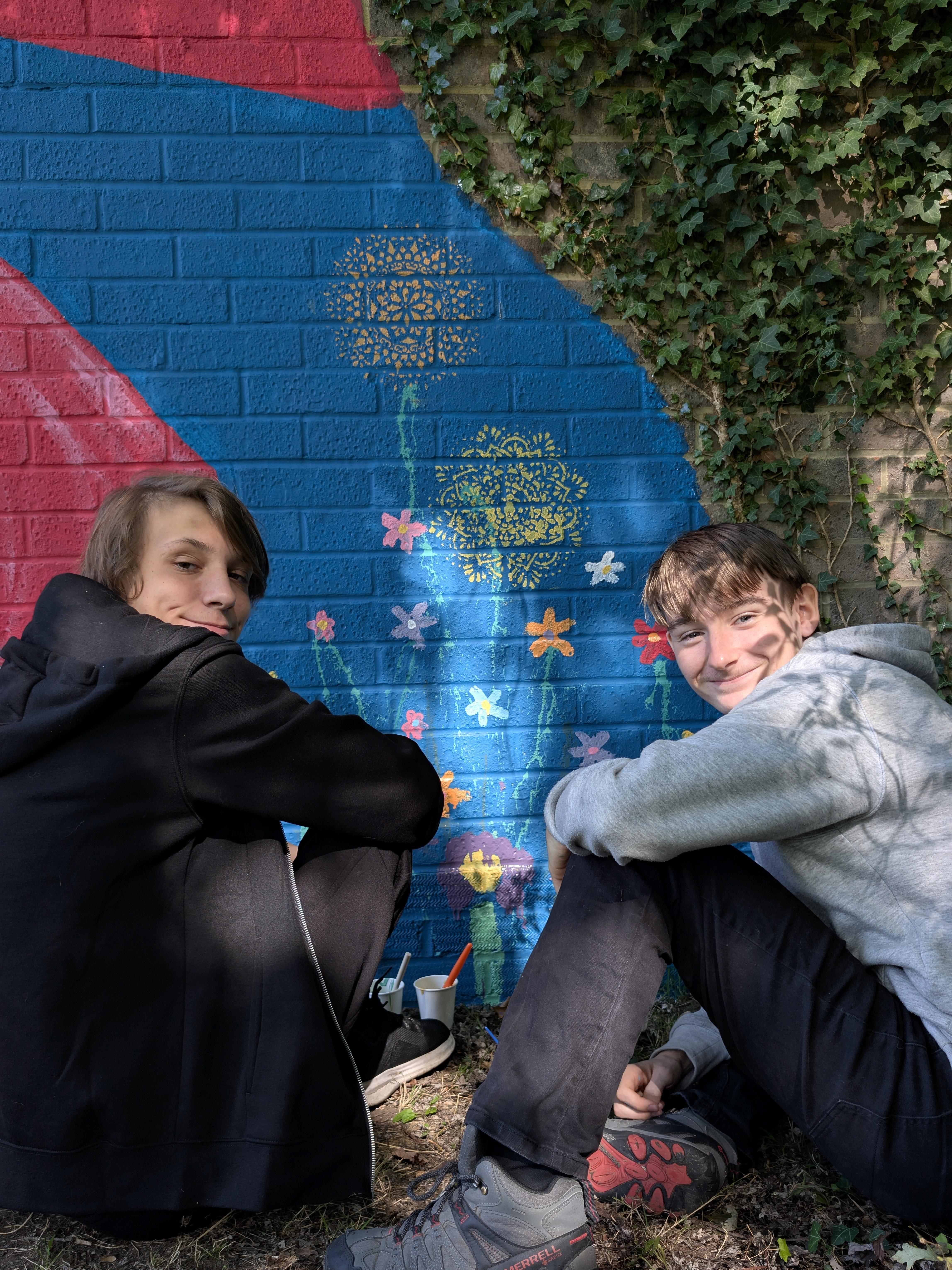 Community participant expressing creativity as part of the Wild & Wonder™ mural experience designed by Janine Tonkin™.Young aspiring artist Joseph Dennehy