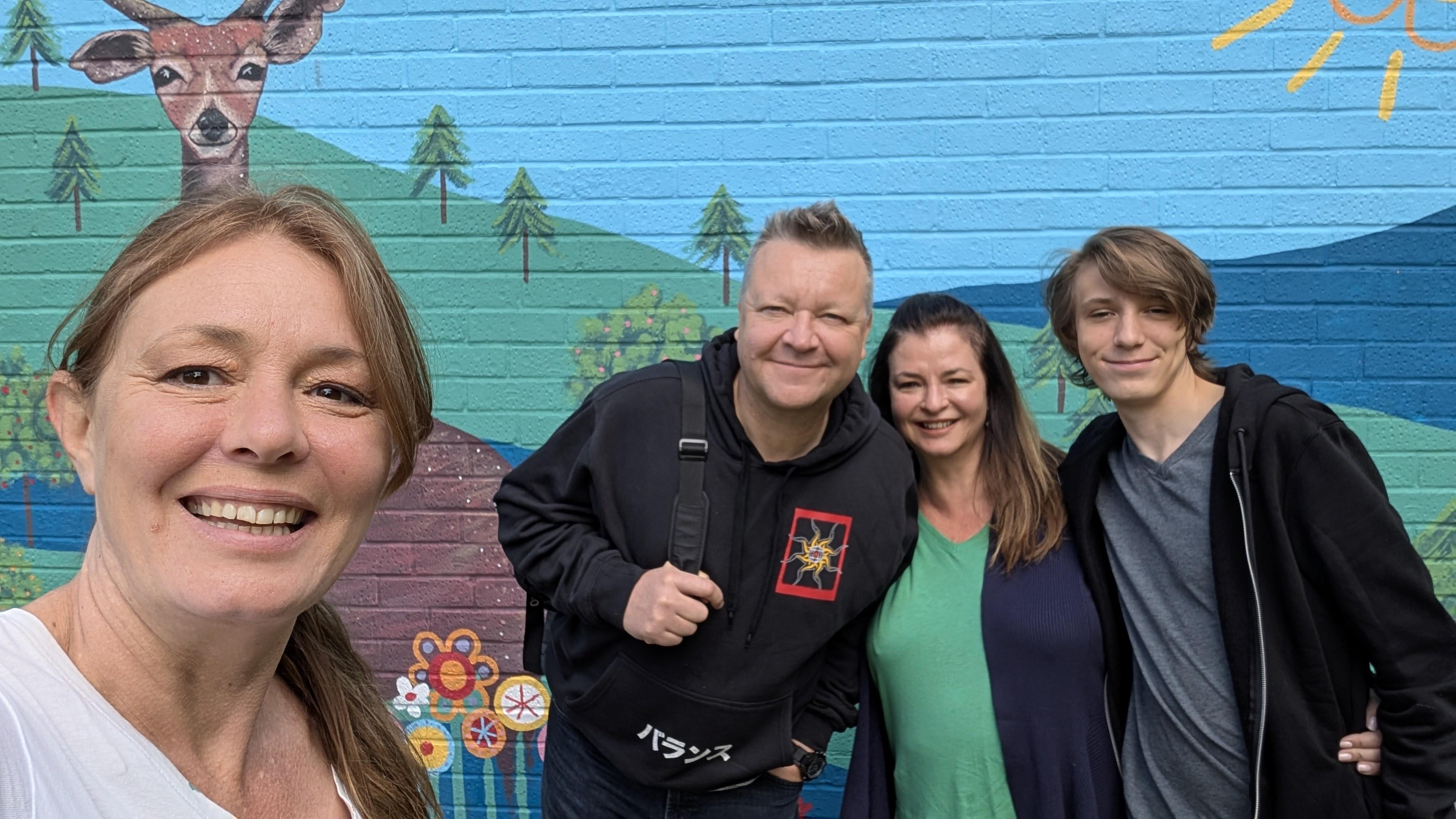 Janine Tonkin™ with her family, who also took part in the Wild & Wonder™ community mural celebration and painting experience.