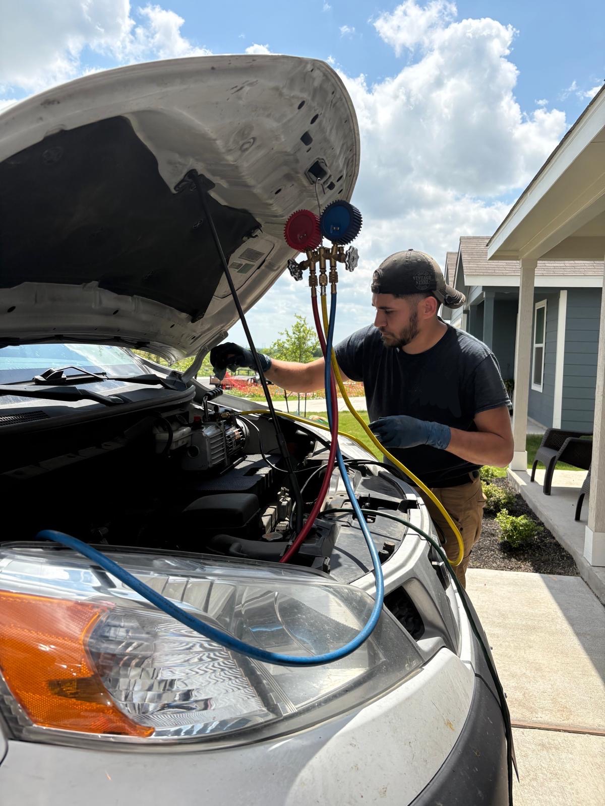 Mechanic balancing and aligning tires