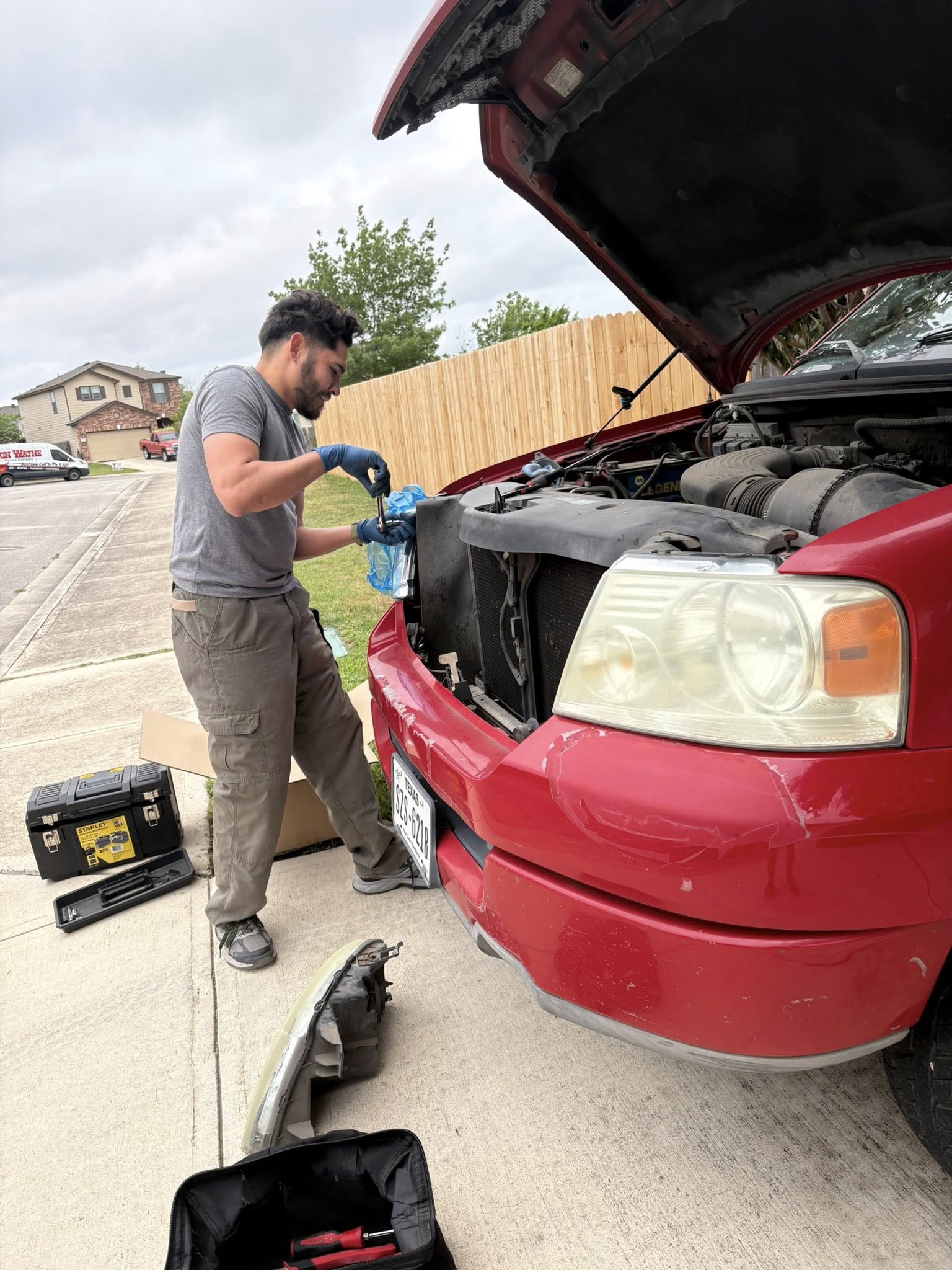 Mechanic performing oil change