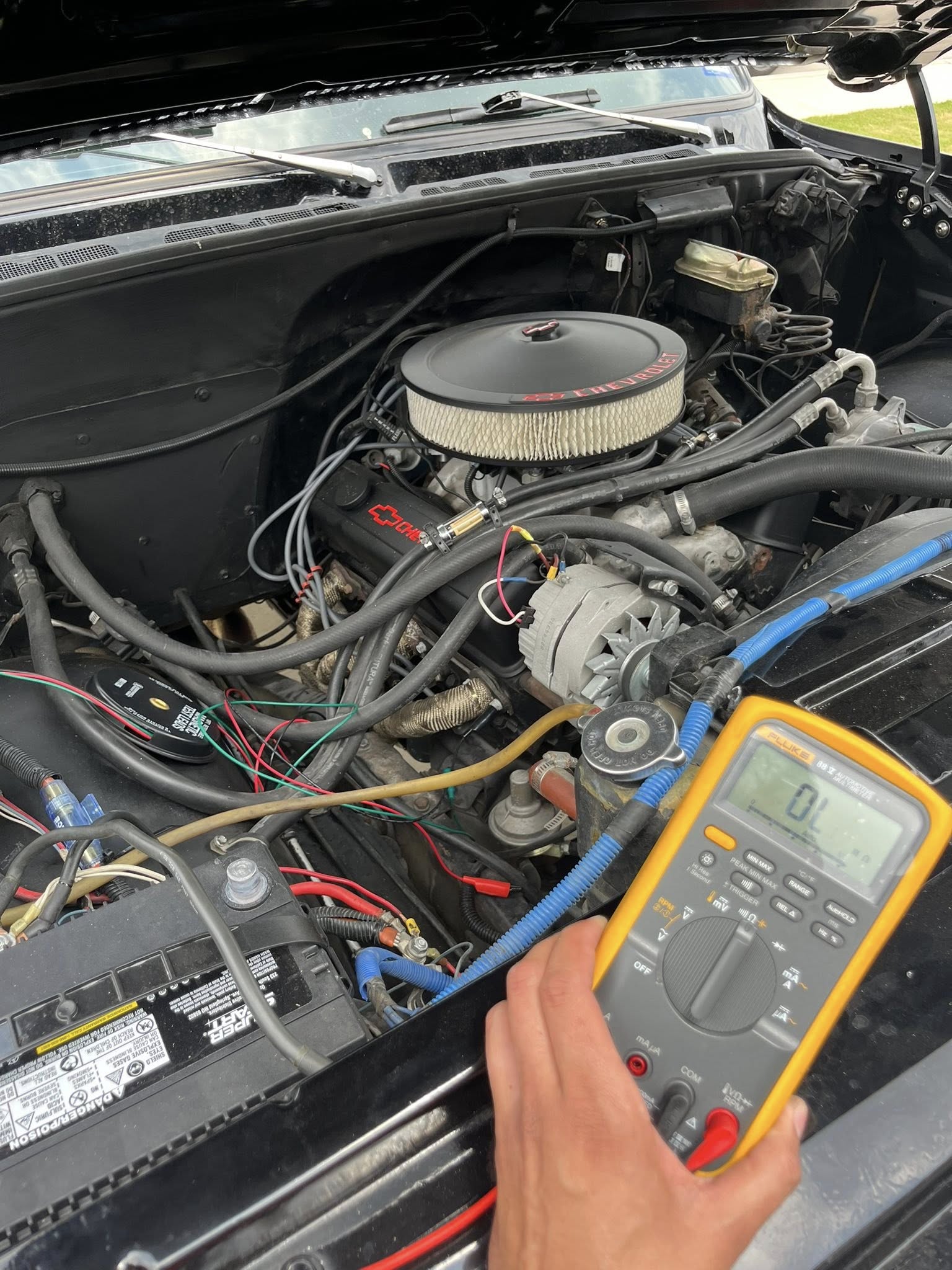 Mechanic performing engine diagnostics
