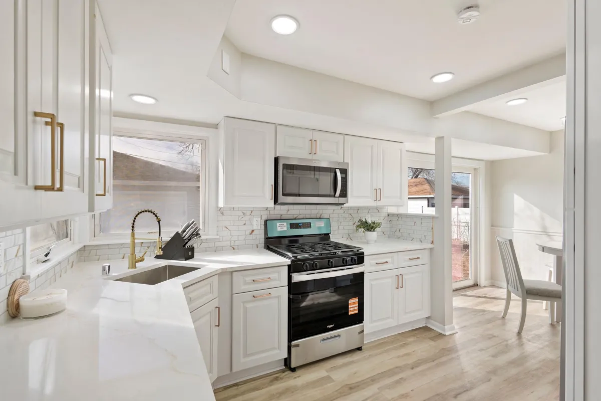 Modern kitchen island and cabinetry by Pro Partners Remodeling Milwaukee
