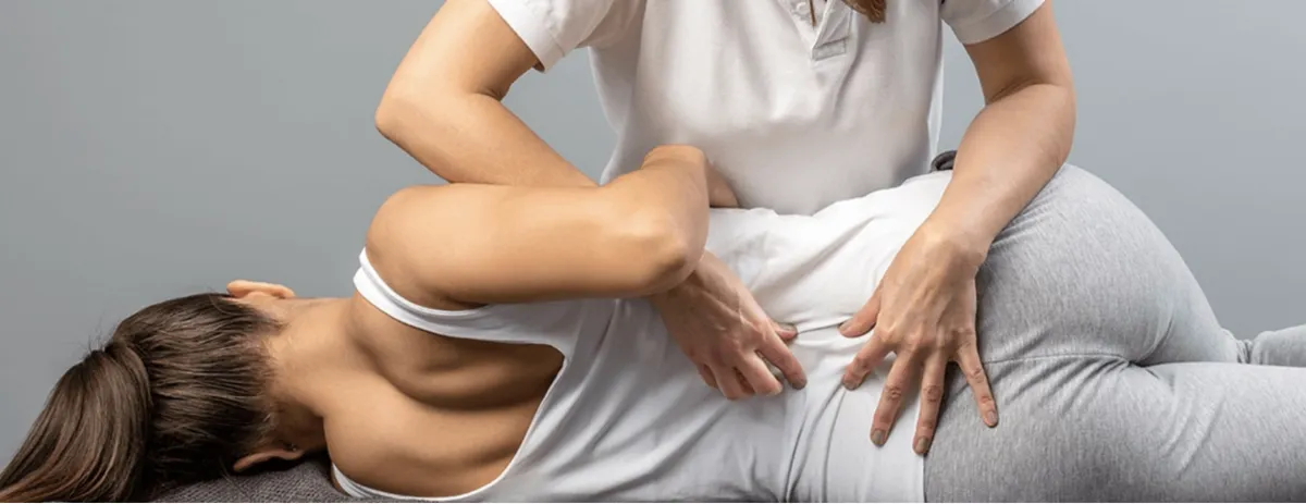 a sign that is hanging from a building