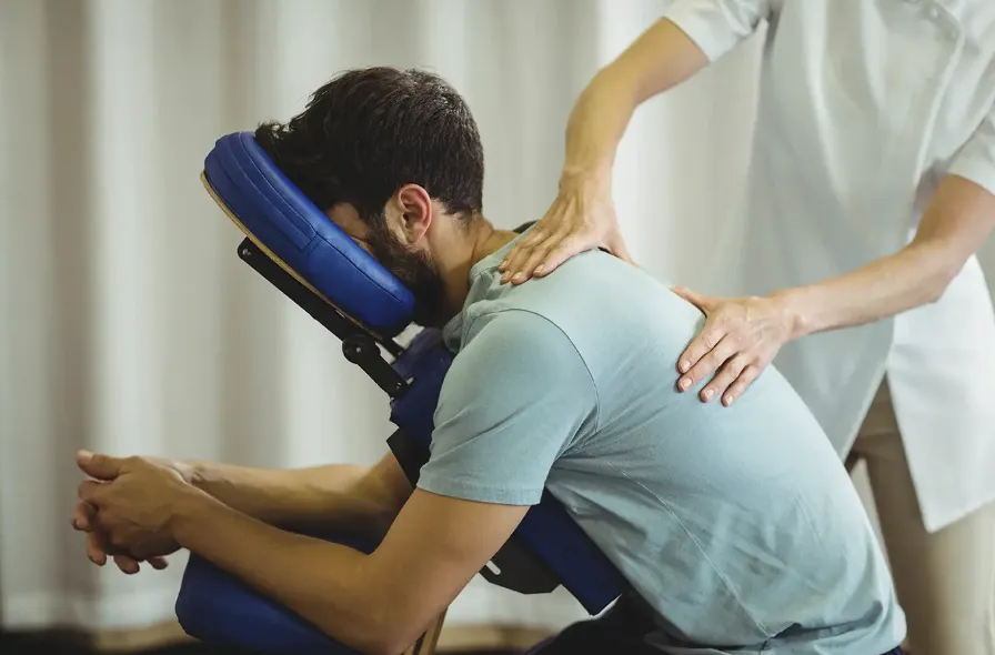 person in black leather shoes