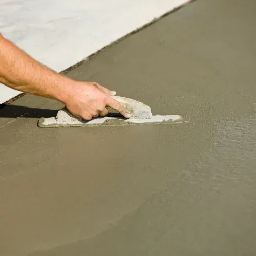 Concrete finishing with trowel, M Z Masonry concrete services in Houston, TX.