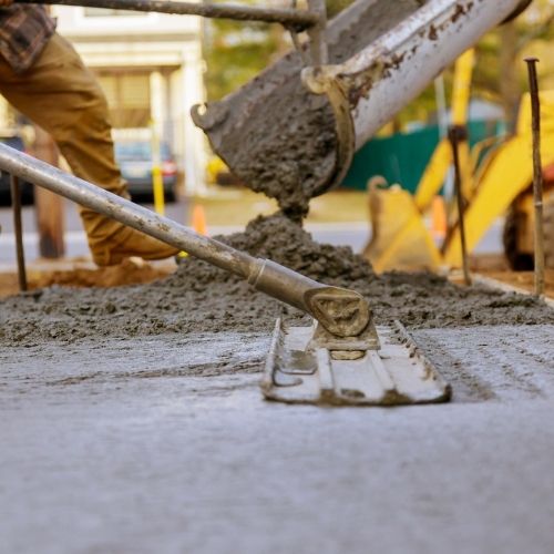 Concrete pouring and leveling for durable patios and walkways by M Z Masonry.
