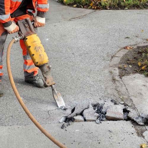 Concrete demolition with jackhammer for repair or replacement in Fresno, TX