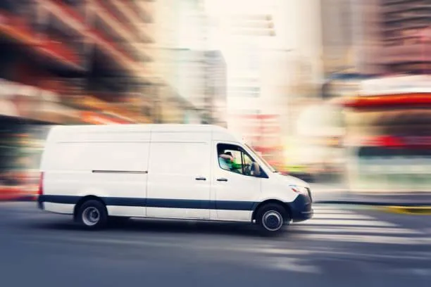 Jec Osp Logistics delivery van driving for same day delivery