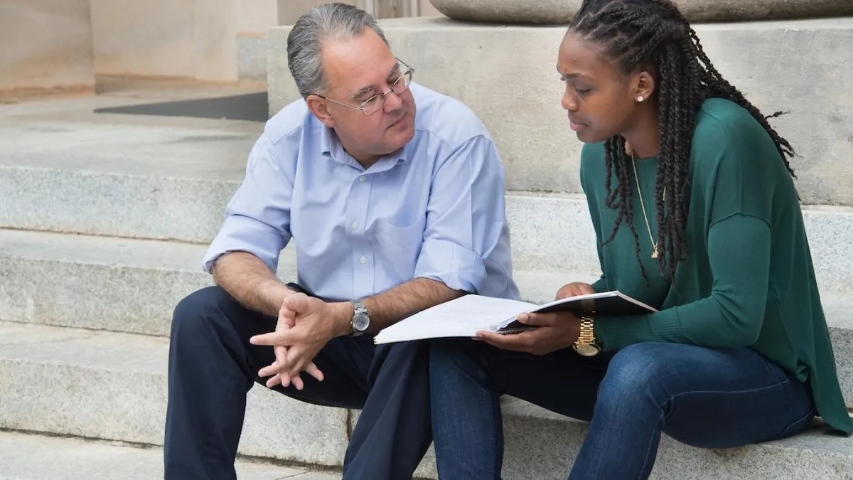 A student and a professor 