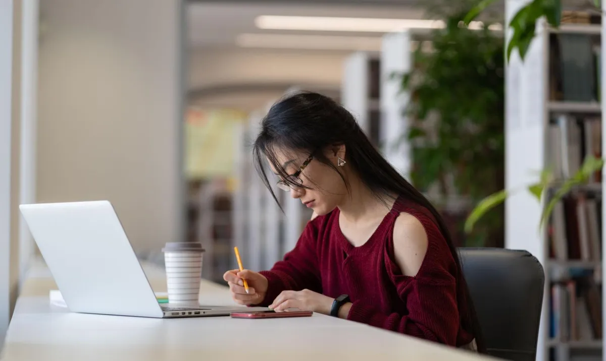 A student working on their laptop