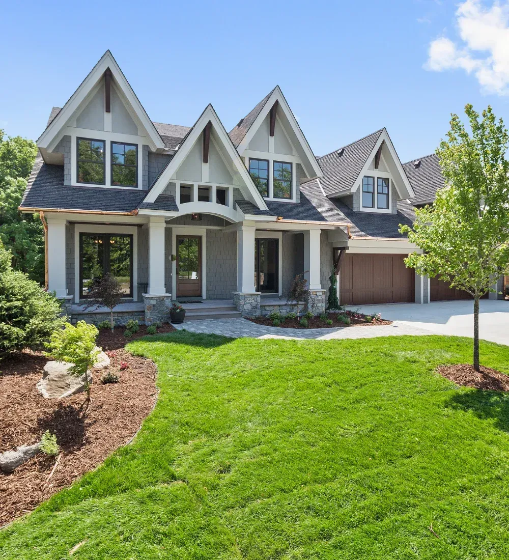 Lititz, PA house with shrubs in front of the house and a nice maintenance lawn