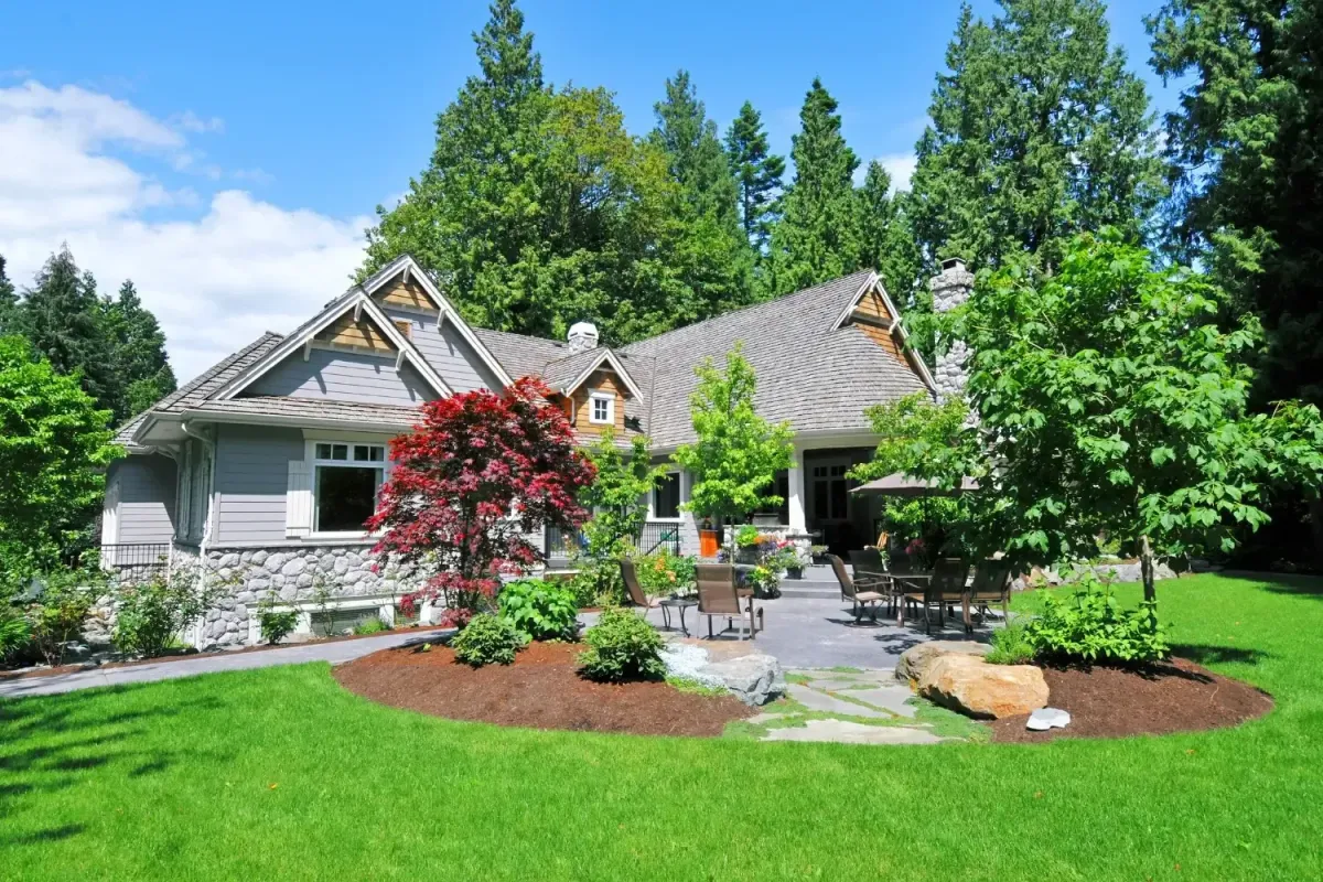 Healthy green grass with mulch installation in Lititz, PA