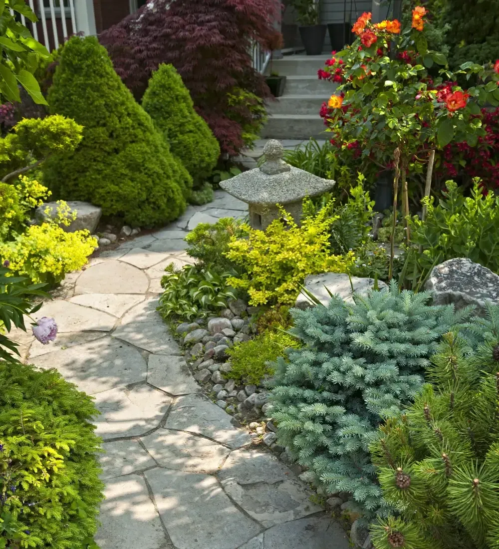 Lititz, PA house with shrubs in front of the house and a nice maintenance lawn